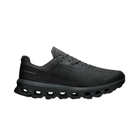 A black ON Running Cloudvista 2 sneaker with a distinctive sole design, featuring circular elements for cushioning.