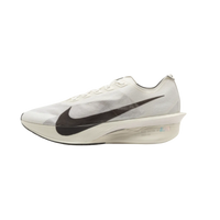 White running shoe with black swoosh logo on a beige background