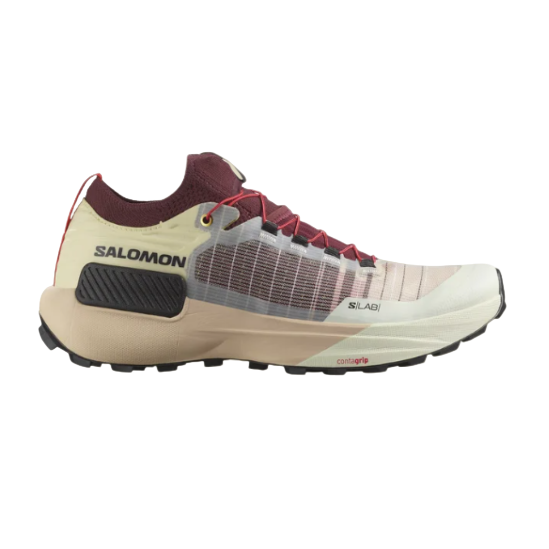 A pair of Salomon S/LAB GENESIS trail running shoes in beige, red, and black color scheme.