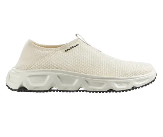 A pair of white Salomon REELAX MOC 6.0 recovery shoes with a mesh upper and a collapsible heel design.
