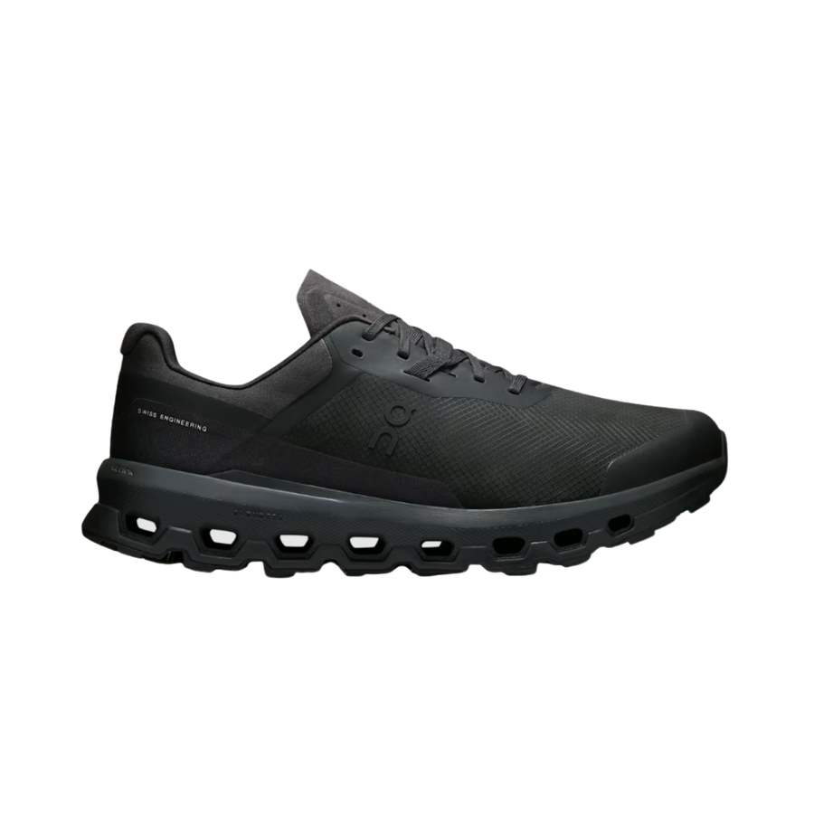 A black ON Running Cloudvista 2 sneaker with a distinctive sole design, featuring circular elements for cushioning.