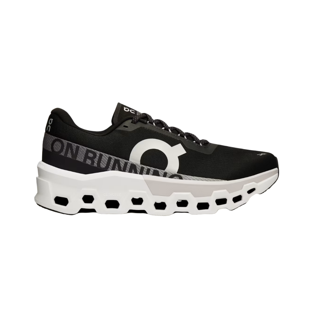 A black and white ON Running Cloudmonster 2 sneaker with a mesh upper and a unique sole design for running.