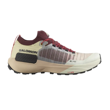 A pair of Salomon S/LAB GENESIS trail running shoes in beige, red, and black color scheme.