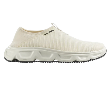 A pair of white Salomon REELAX MOC 6.0 recovery shoes with a mesh upper and a collapsible heel design.