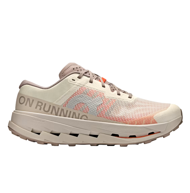 Beige running shoe with 'ON Running' branding on a white background